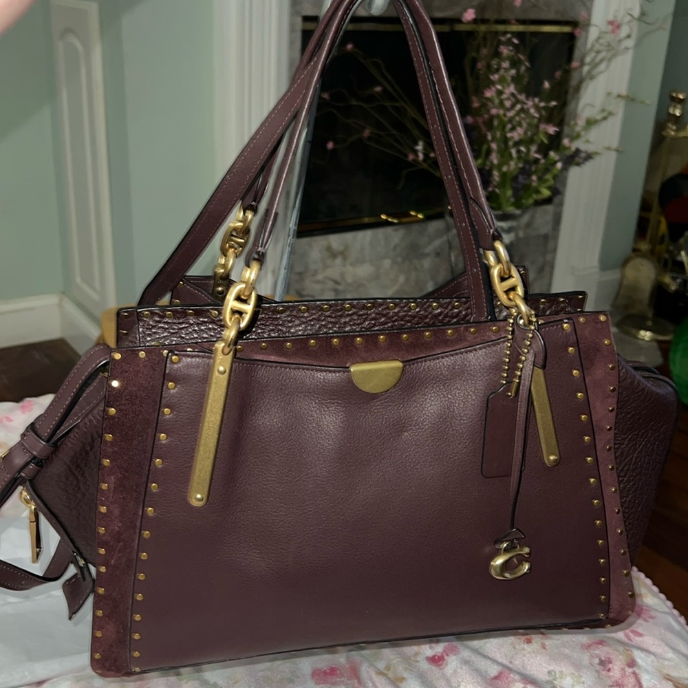 Coach leather and suede satchel. Color is a beautiful Oxblood.